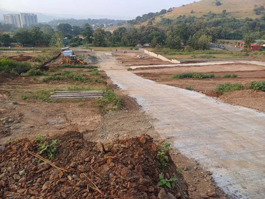 Concrete internal road laid through the layout