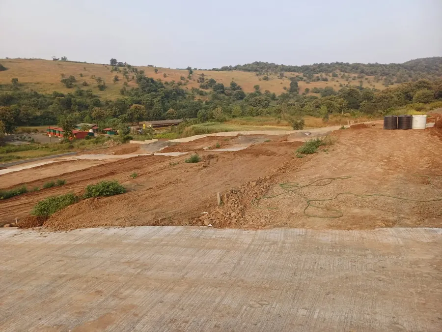 View across the site towards the green hills